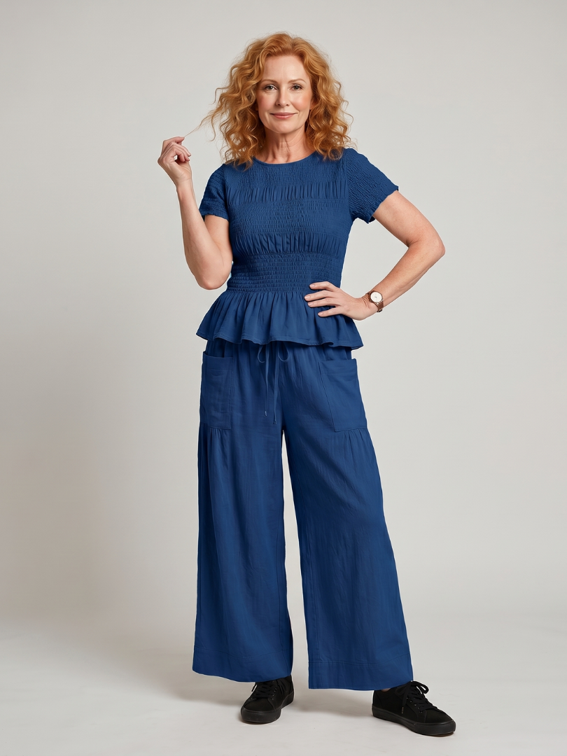 Eirenne | Conjunto de top fruncido con detalle de peplum y pantalones de pierna ancha
