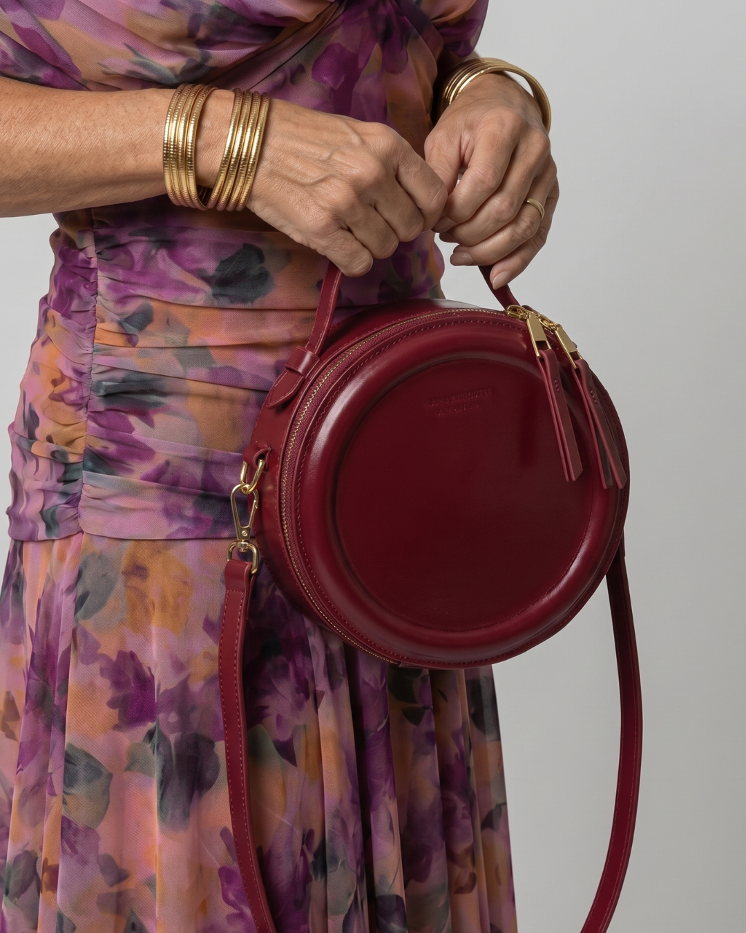 Oriana | Bolso bandolera cruzado redondo con cremallera