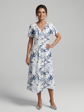 Kael | Vestido midi con escote en V y estampado botánico suave