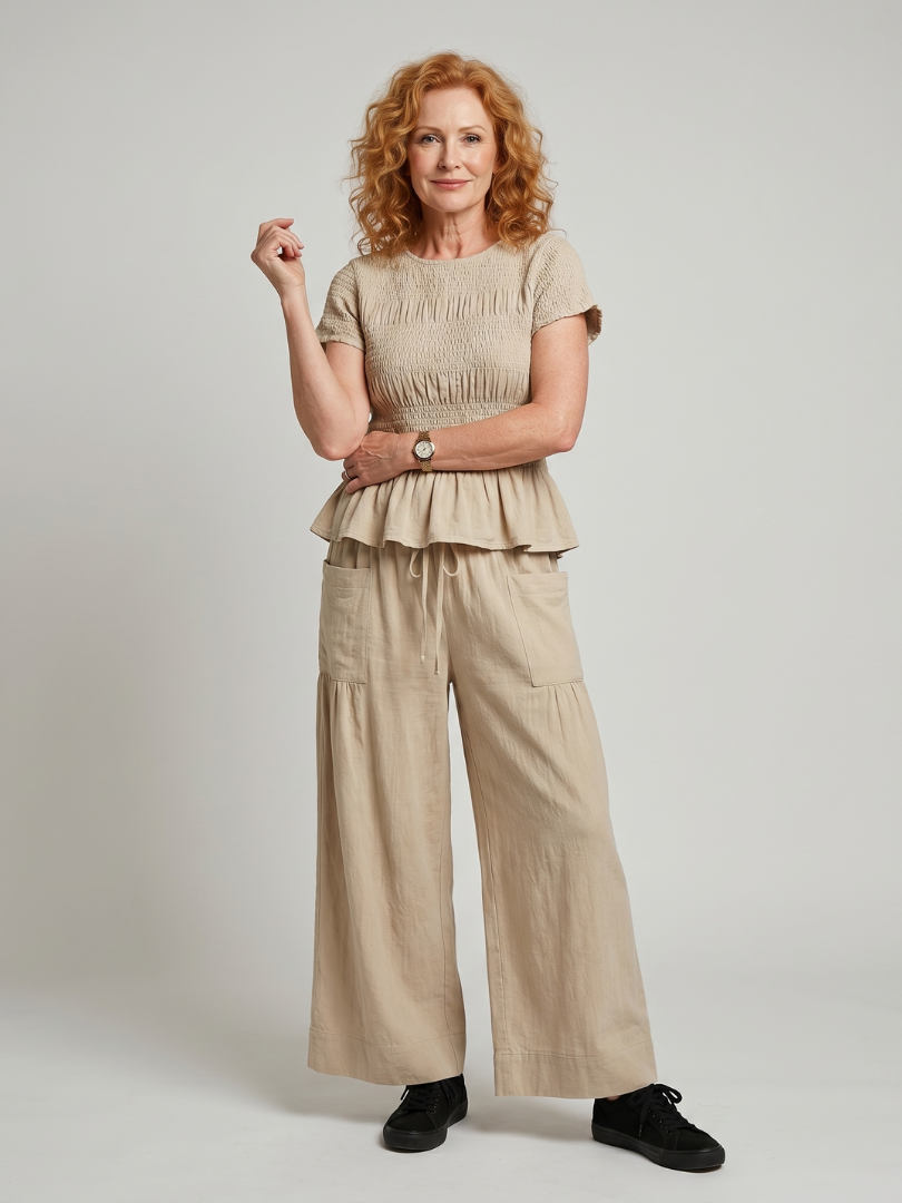 Eirenne | Conjunto de top fruncido con detalle de peplum y pantalones de pierna ancha