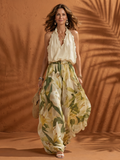 Solange | Blusa de cuello halter floral y pantalón de pierna ancha