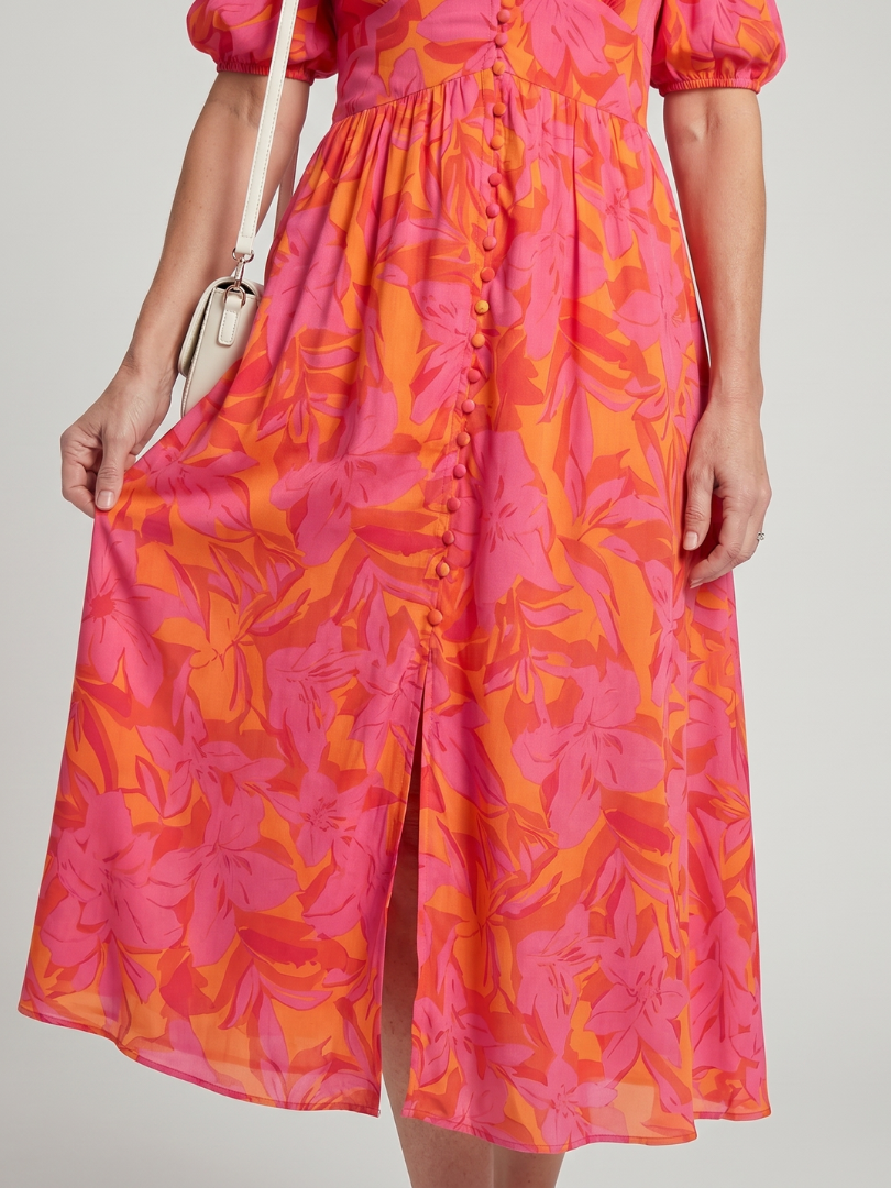 Zarelle | Vestido midi con manga abullonada y escote en V, estampado floral audaz
