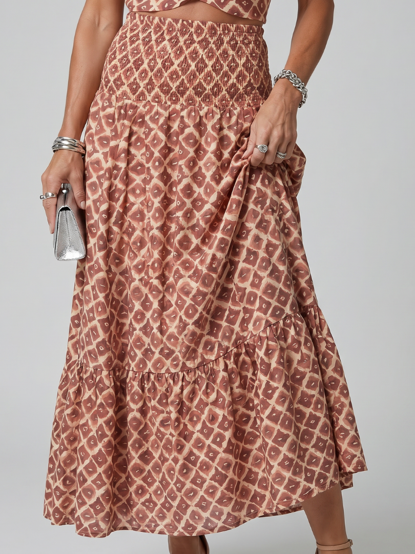 Amira | Vestido midi con recortes y cuello halter cruzado de estampado geométrico