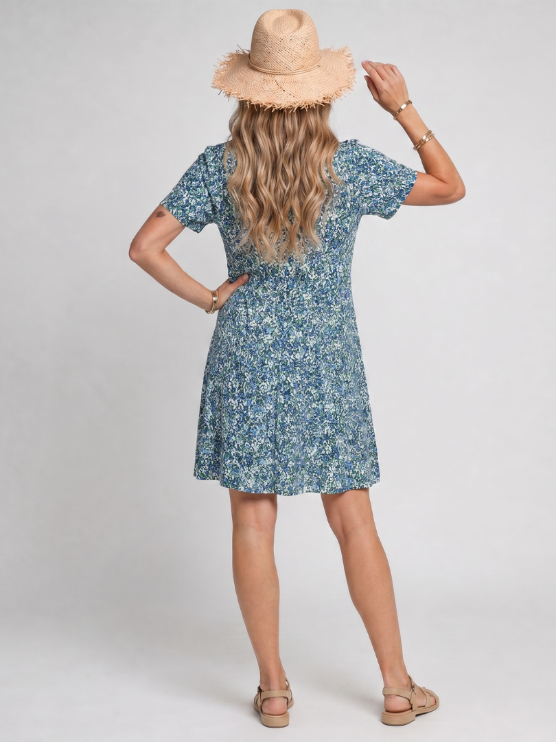 Meraki | Vestido de largo midi con manga corta y estampado tropical