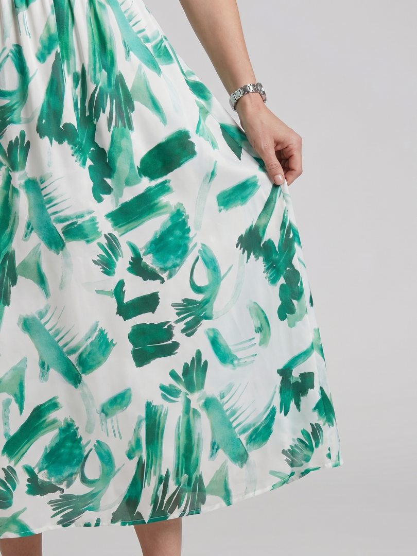 Candlia | Vestido midi estampado abstracto con mangas abullonadas y escote en V